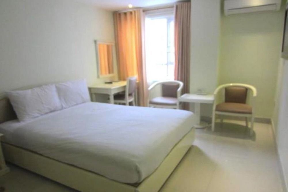 Aha Thanh Long Tan Hotel Хошимин Экстерьер фото