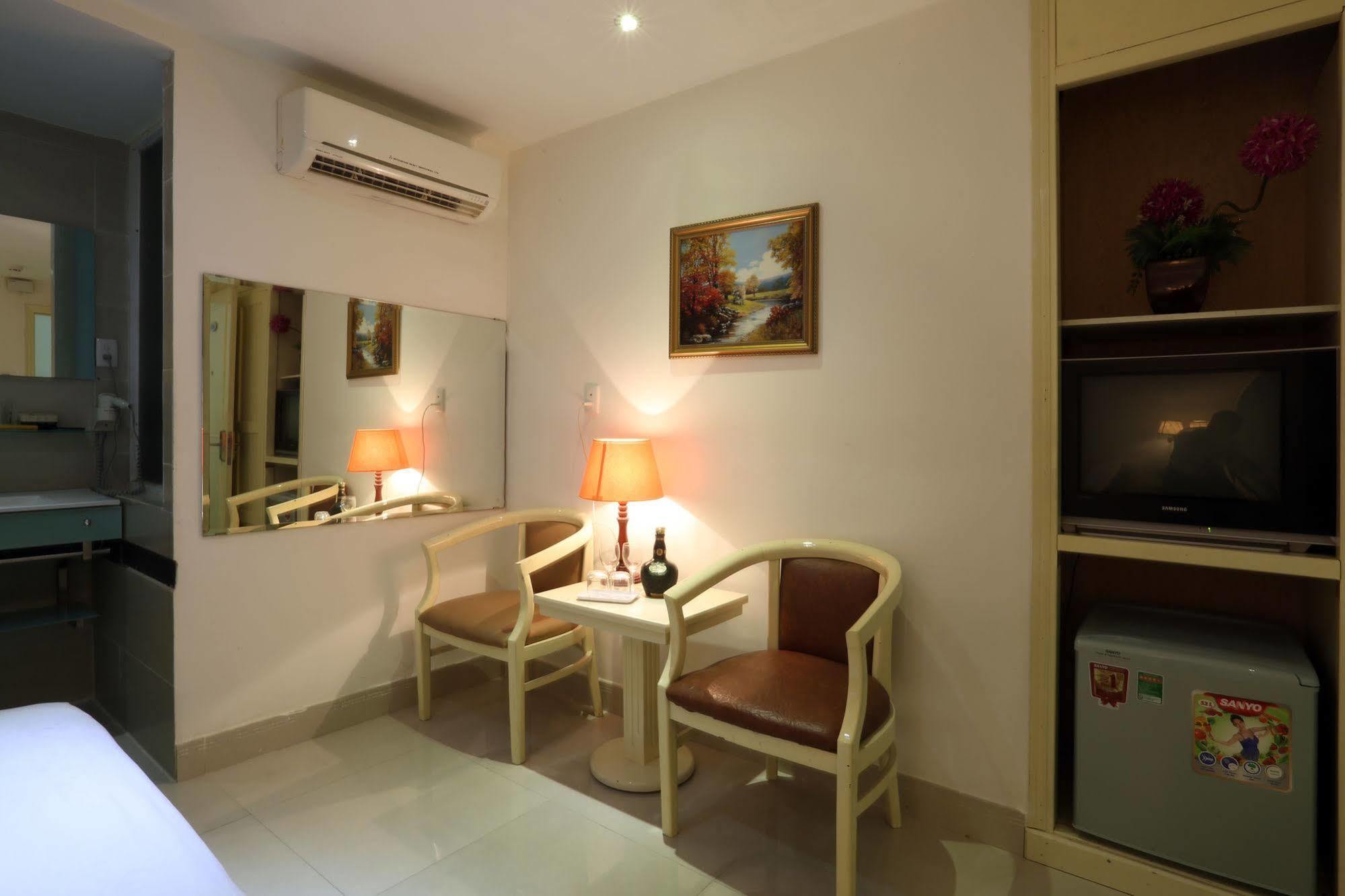 Aha Thanh Long Tan Hotel Хошимин Экстерьер фото