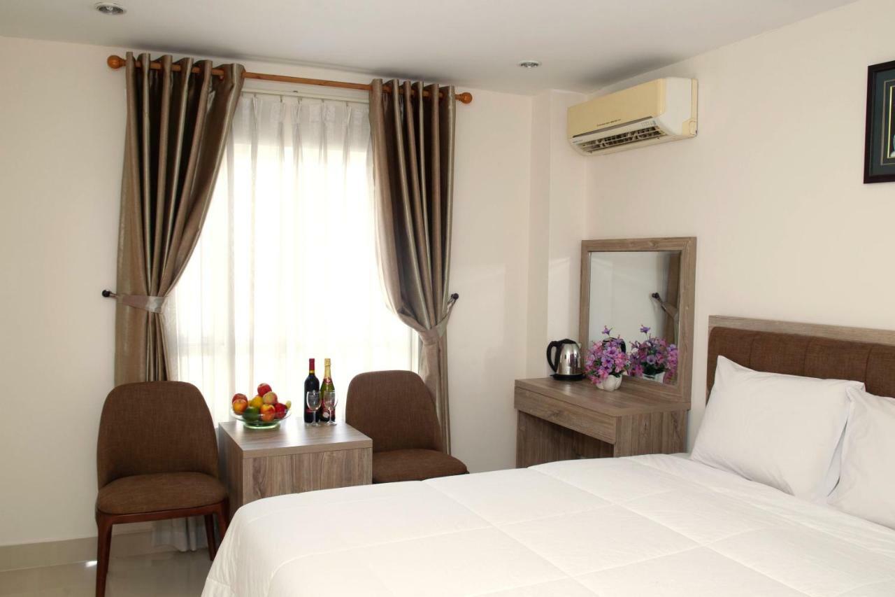 Aha Thanh Long Tan Hotel Хошимин Экстерьер фото