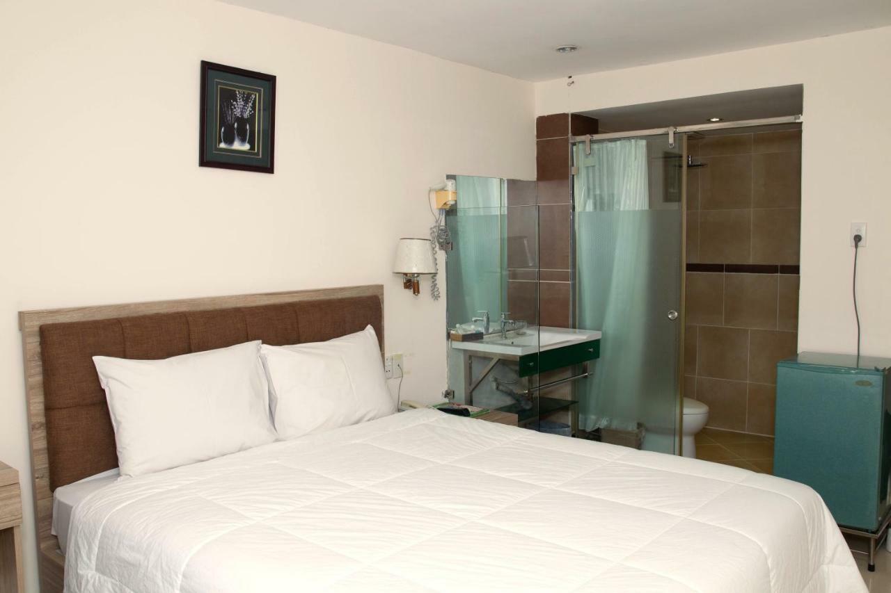 Aha Thanh Long Tan Hotel Хошимин Экстерьер фото