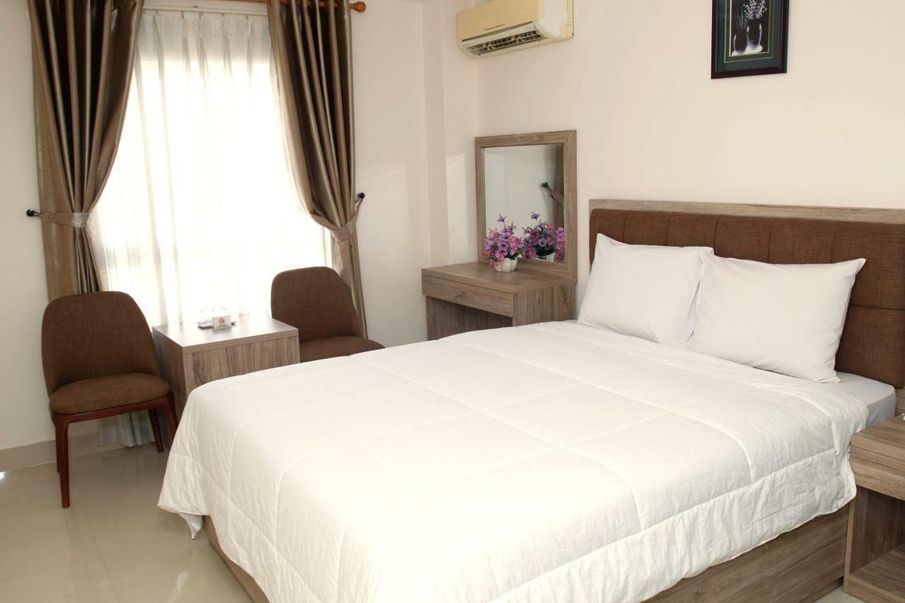 Aha Thanh Long Tan Hotel Хошимин Экстерьер фото